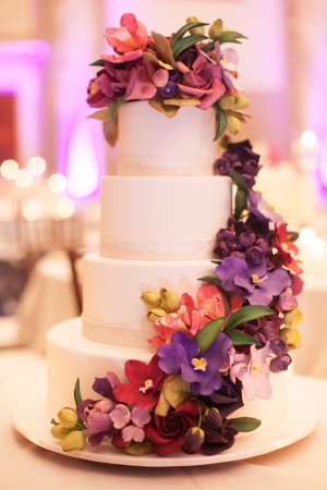 Purple and Fuchsia Floral Garland on Wedding Cake