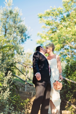 Bride and Groom Kissing in Italian Countryside