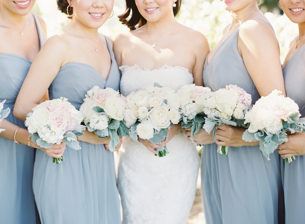 Blue Bridesmaids with Ivory Bouquets
