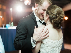 Bride and Groom Kissing During First Dance