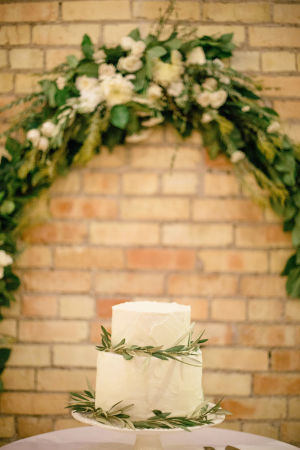 Ivory Wedding Cake With Greenery