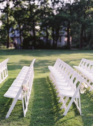 White Folding Chairs Outdoor Wedding Ceremony