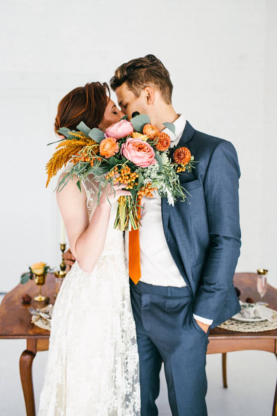 https://elizabethannedesigns.com/wp-content/uploads/2014/09/Orange-Wedding-Flowers.jpg