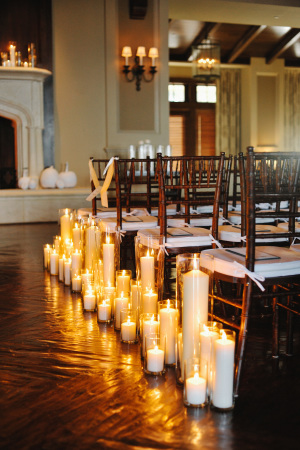 Pillar Candles Along Wedding Aisle