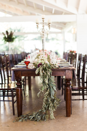 Wooden Tables with Garland Centerpiece