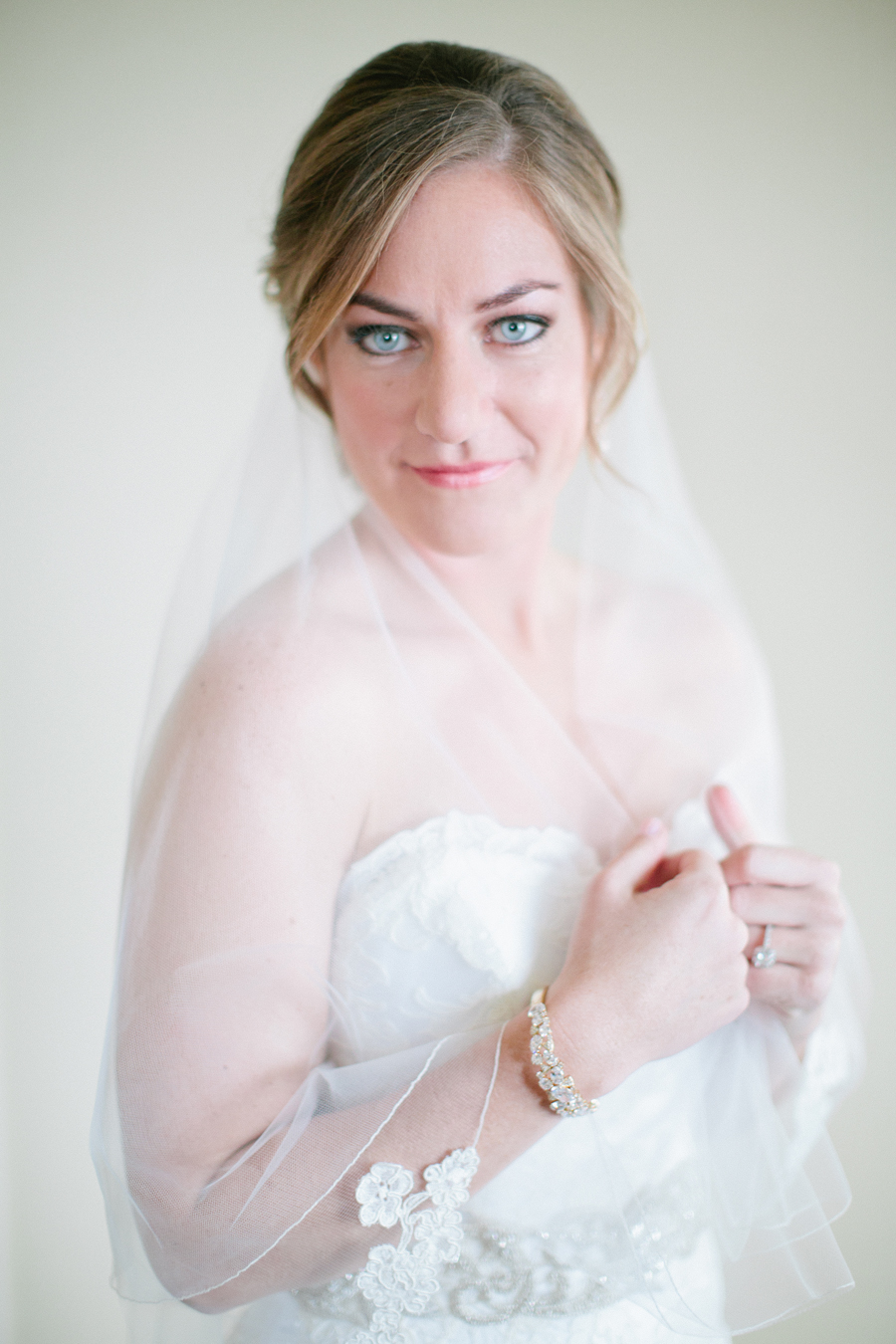 Bride in Lace Trimmed Wedding Veil