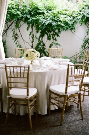 White Reception Table with Gold Chairs