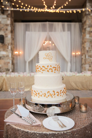 White Wedding Cake with Gold Accents
