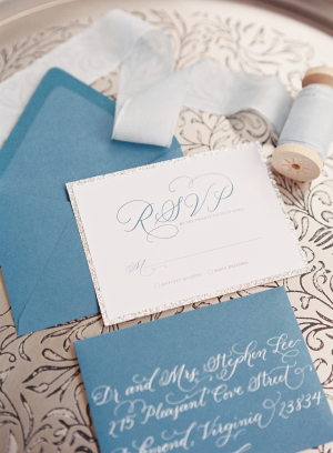 Silver Calligraphy on Blue Stationery