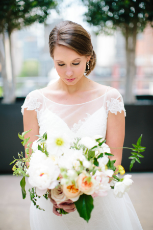Bride with Ivory and Peach Bouquet