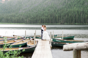 Bride and Groom by Boat Dock