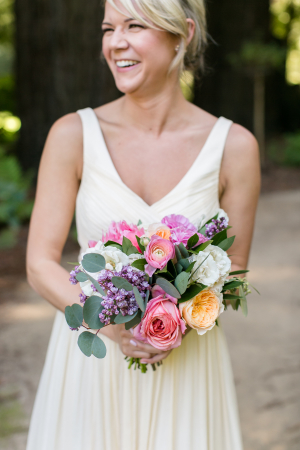 Bridesmaid in White with Colorful Bouquet