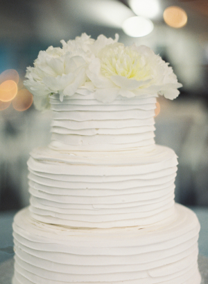 Cake with White Flowers on Top