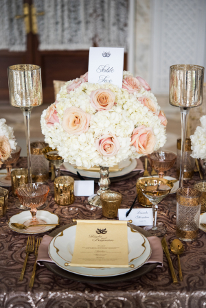 Centerpiece of Peach and Ivory Flowers
