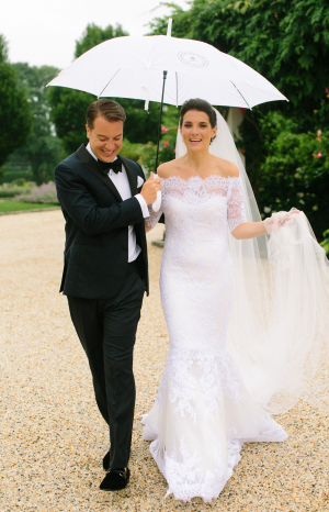 Bride and Groom Under Umbrella