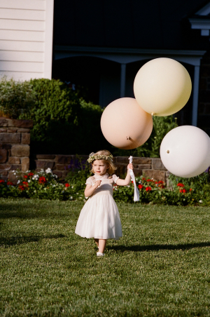 Flower Girl Holding Balloons