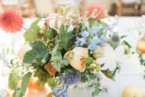 Centerpiece with Blue and Peach Flowers