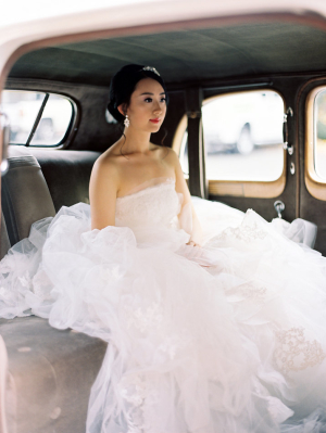 Bride in Vintage Wedding Car