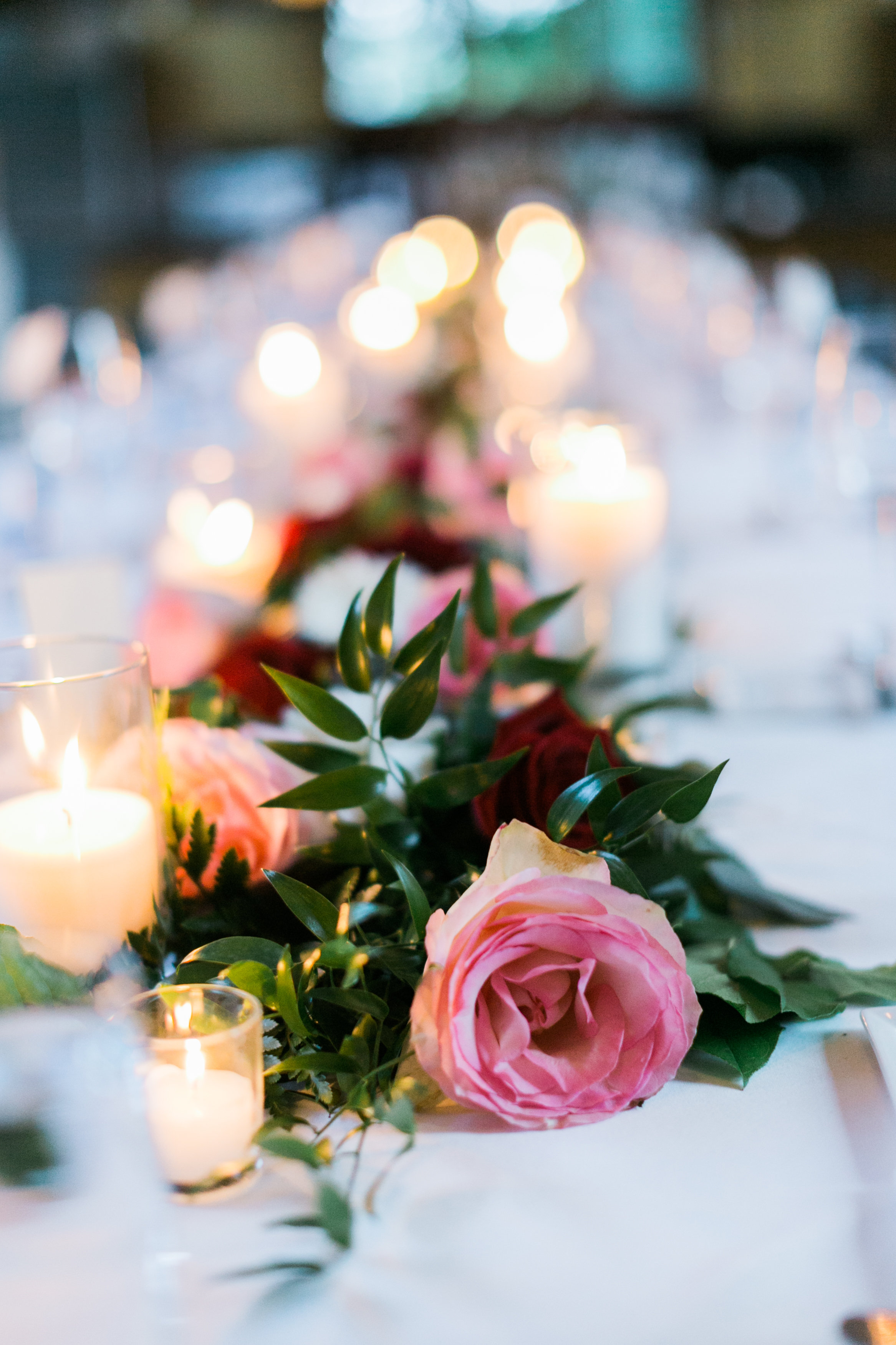 Centerpiece with Pink Roses and Greenery