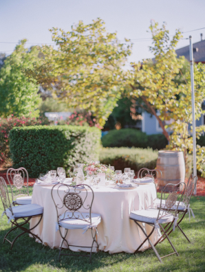 Garden Wedding with Decorative Wrought Iron Chairs