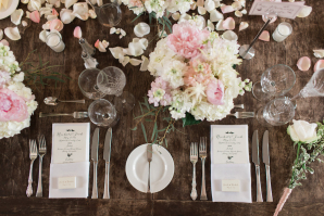 Pink and Ivory Flowers on Wooden Table