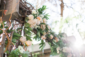 Rustic Ceremony Arbor with Pink Flowers