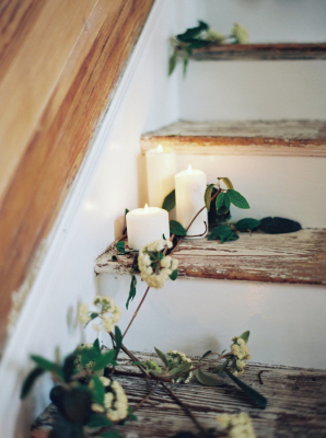 White Pillar Candles on Stairs
