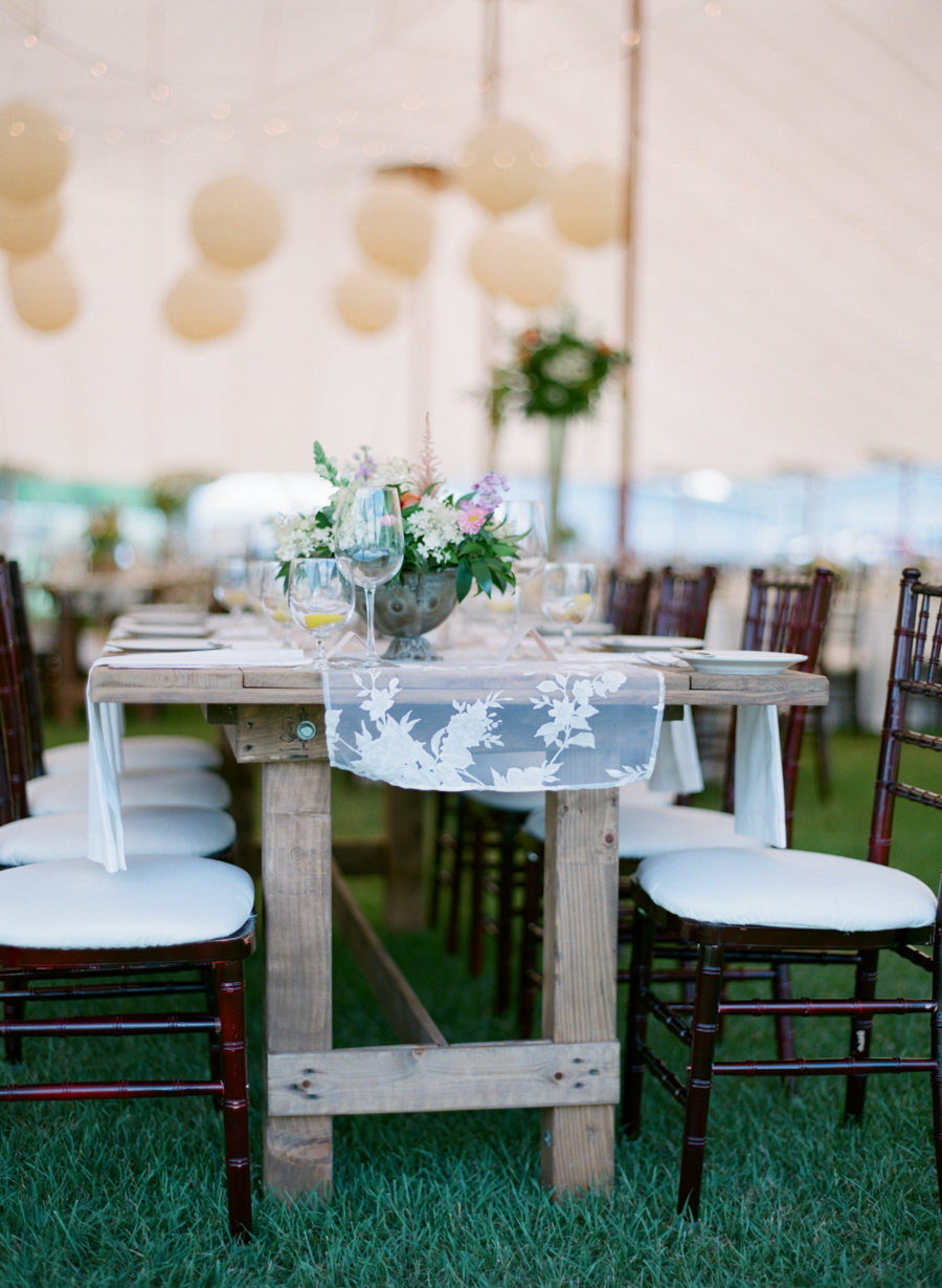 Farmhouse Tables in Wedding Tent