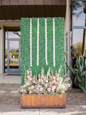 Escort Cards on Faux Greenery Wall