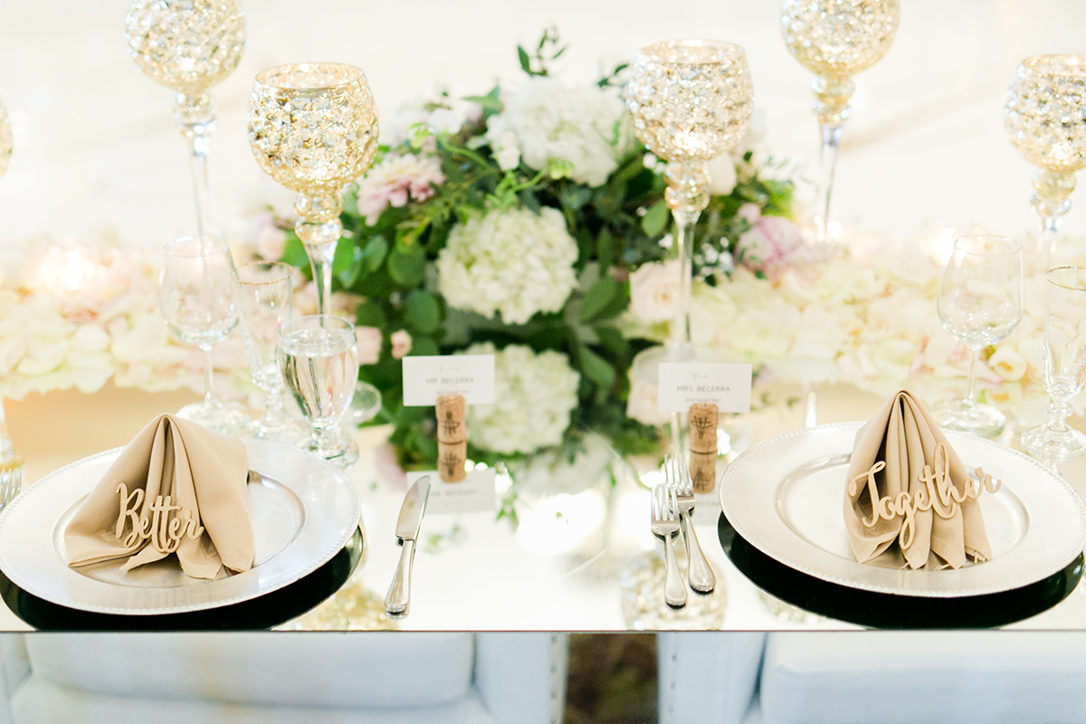 Ivory and Green Centerpiece on Mirror Table