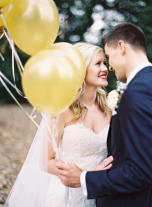 Bride and Groom with Gold Balloons