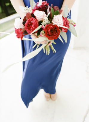 Blue Bridesmaid Dress with Red Bouquet