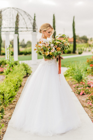 Bride with Sunset Colored Bouquet
