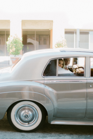 Bride and Groom in Vintage Car
