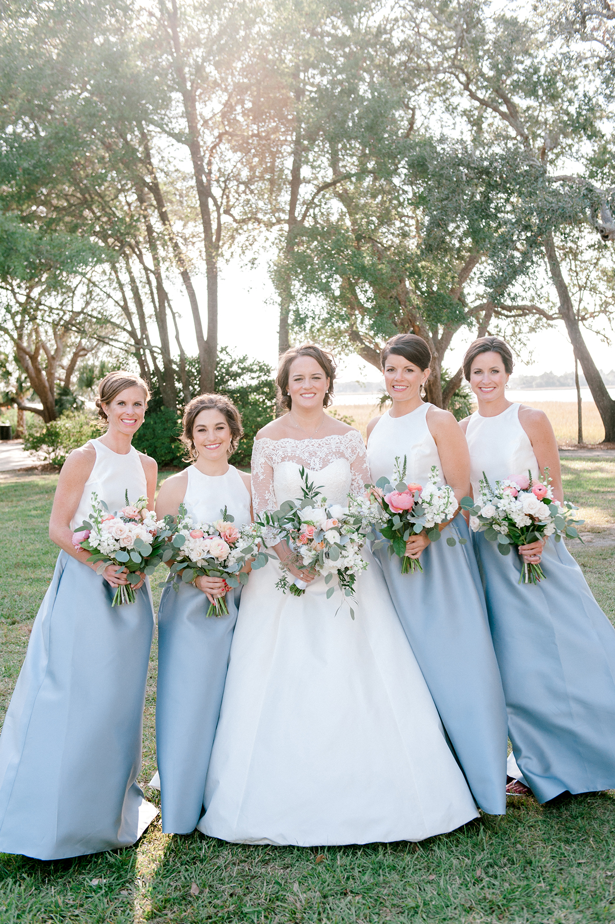 Bridesmaids in White and Blue Dresses