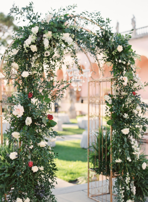 Wedding Arbor with Greenery and White Flowers