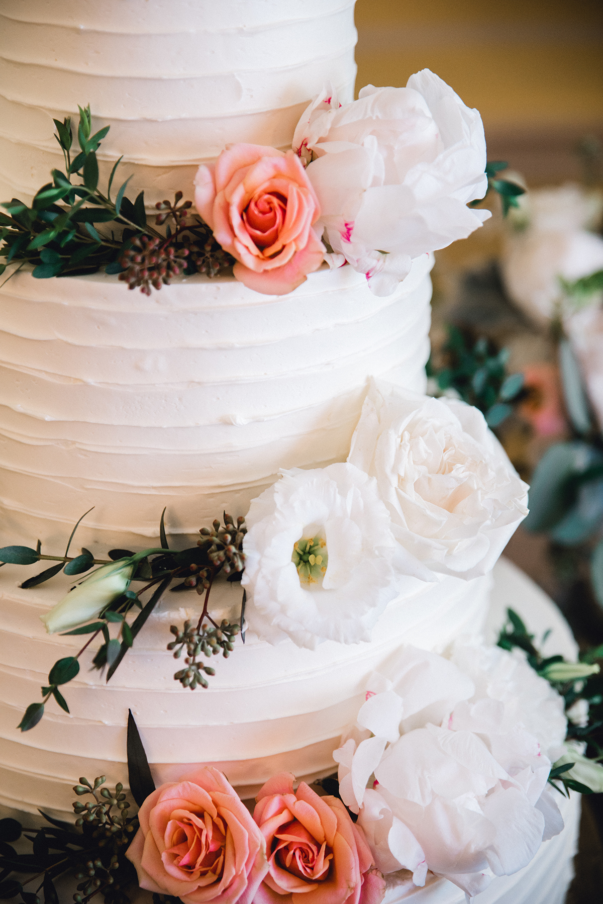Wedding Cake with White and Pink Flowers