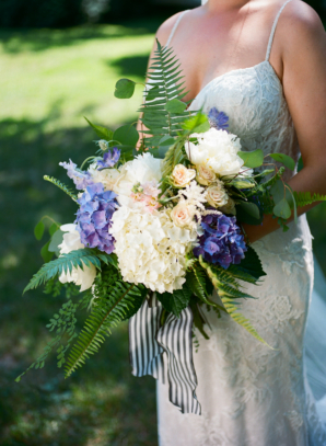 Bride with White and Purple Bouquet and Striped Ribbon
