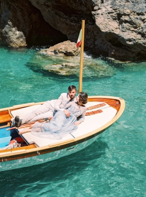 Bride in Groom on Boat in Amalfi Coast
