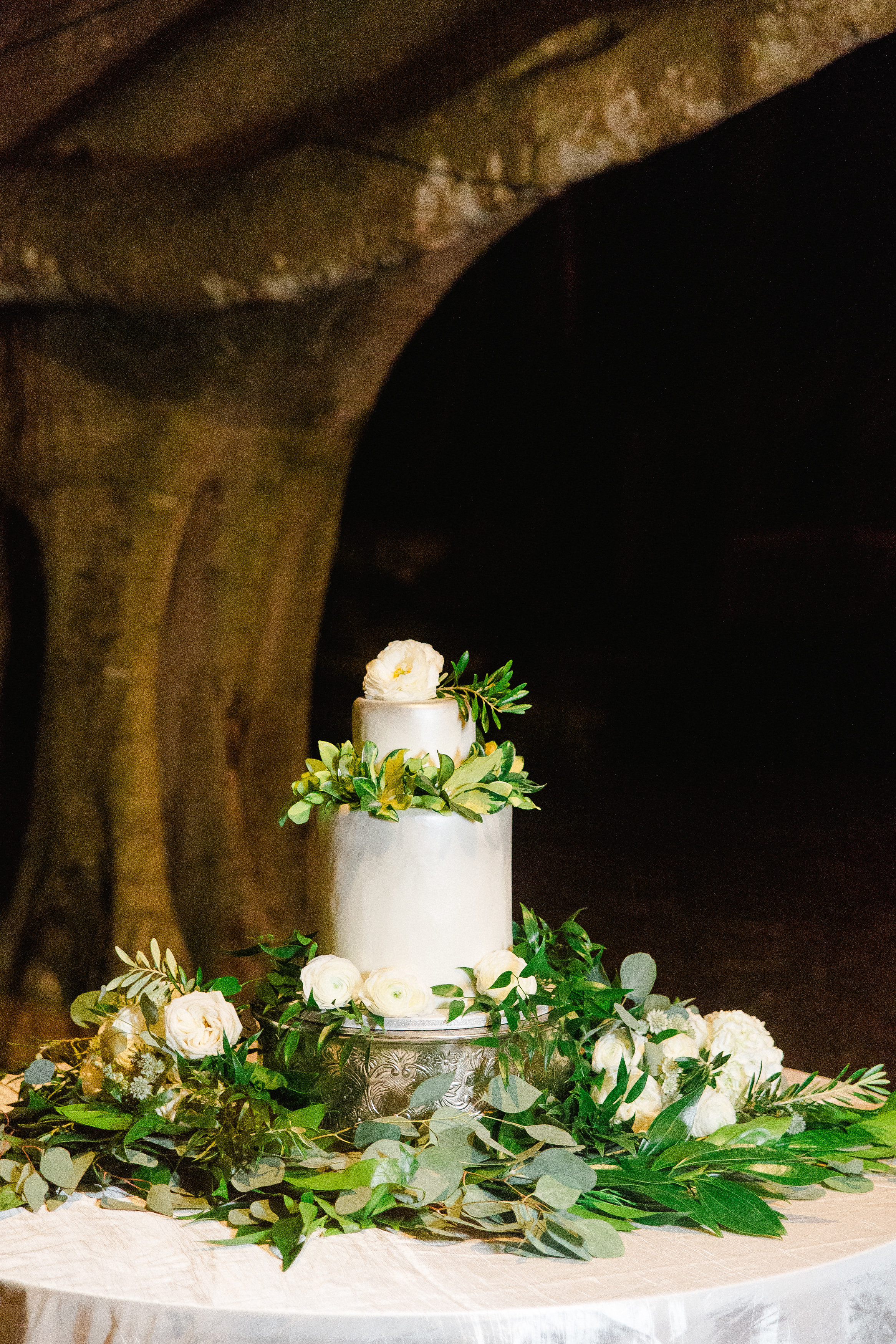 Wedding Cake with a Bed of Greenery