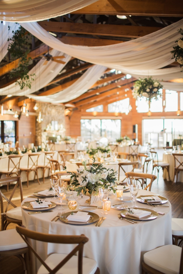 White and Gold Wedding Reception with Greenery