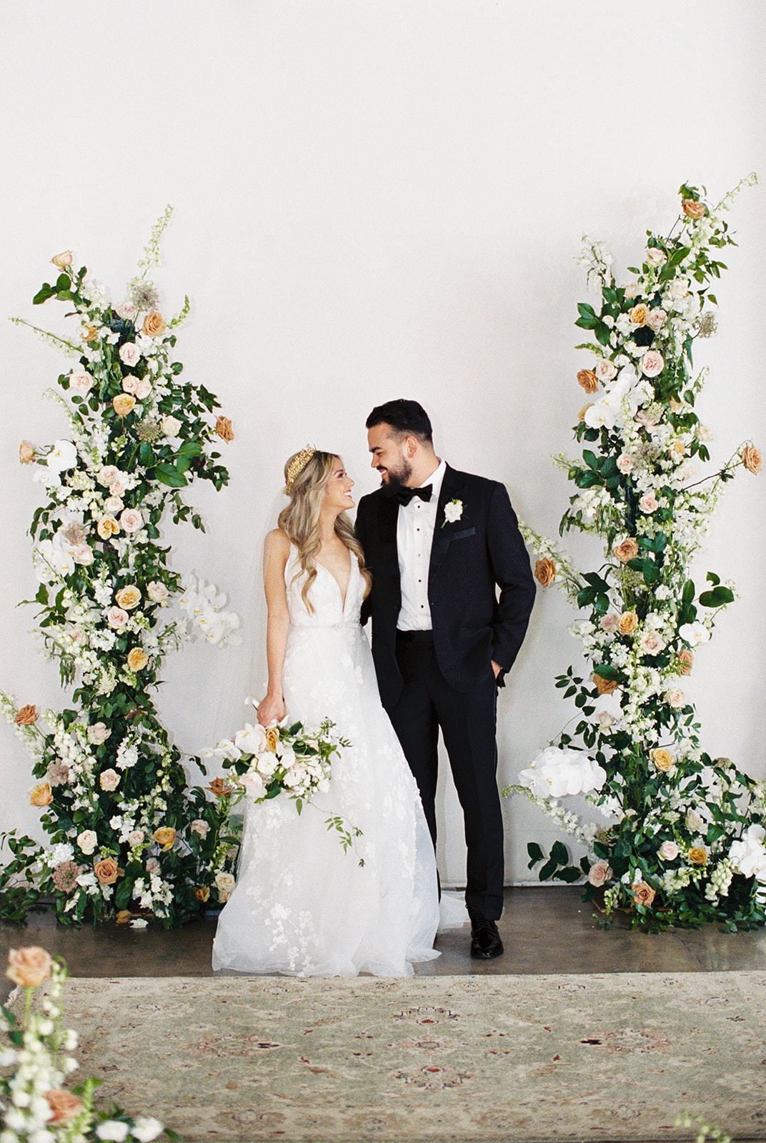 Ivory and Gold Wedding Ceremony Florals