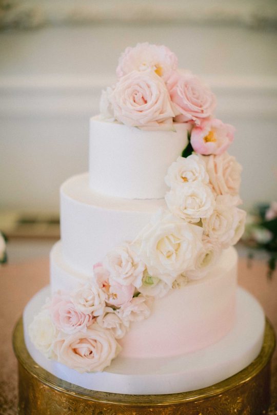 Elegant Ivory Wedding Cake with Roses