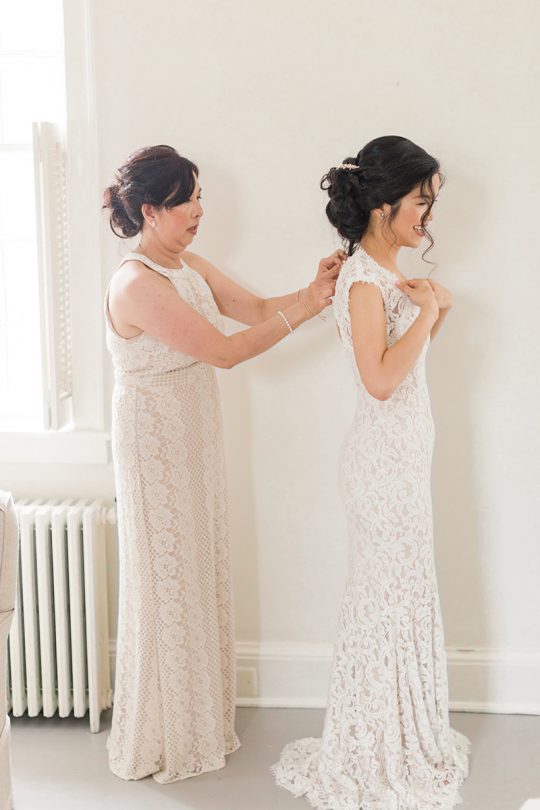 Bride and Mother Getting Ready Wedding Photo