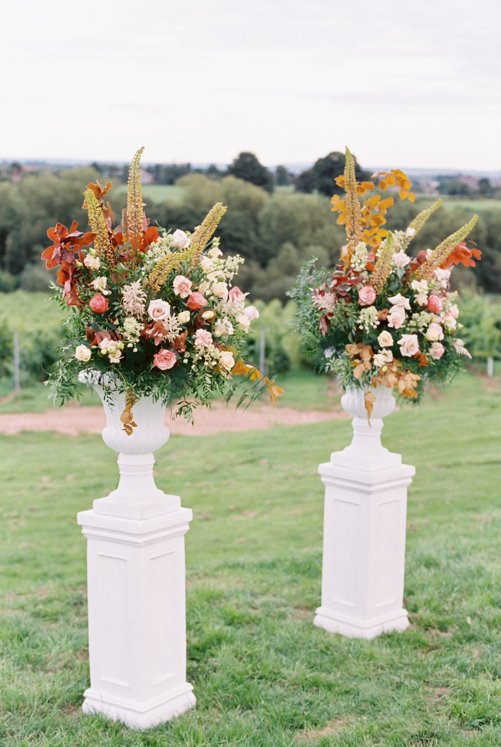 Tall Fall Colored Wedding Ceremony Floral Arrangement Inspiration
